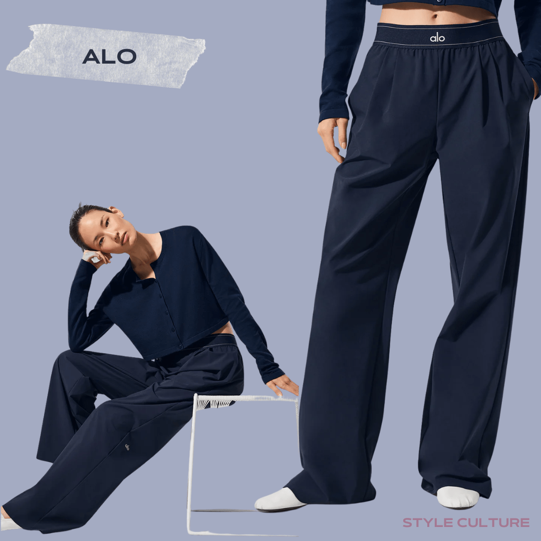 alo_suit_up_trouser_styleculture_style Alo yoga model featuring the viral pant in navy and knitwear blouse also in navy