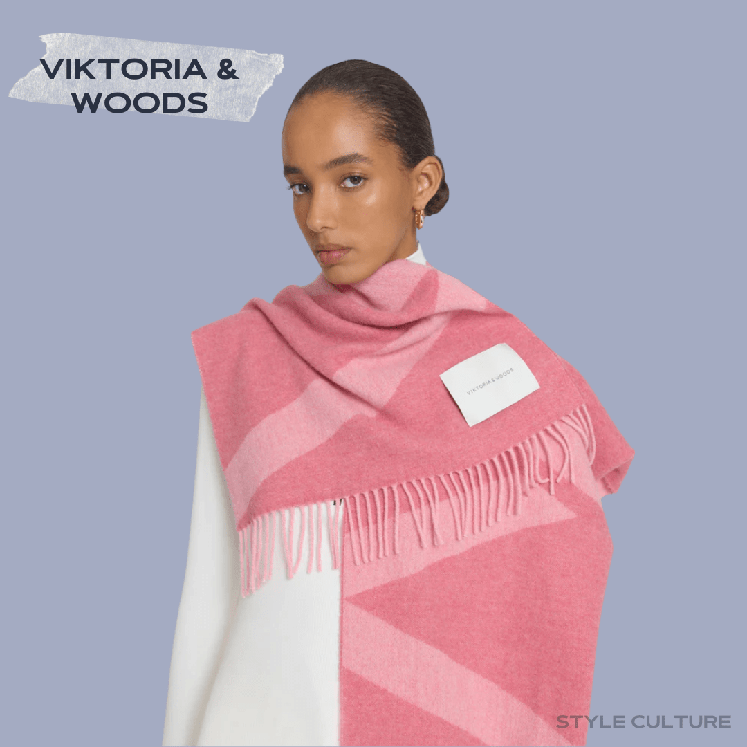 viktoria_and_woods_scarf Model showcasing a pink patterned winter fringe scarf from Viktoria & Woods.