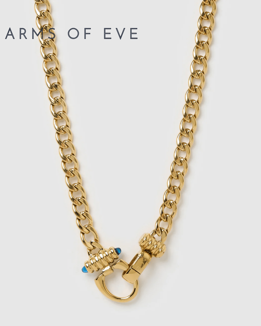 Arms of Eve Tauba Gold Necklace Arms of Eve Tauba chunky gold chain necklace with blue stone details.