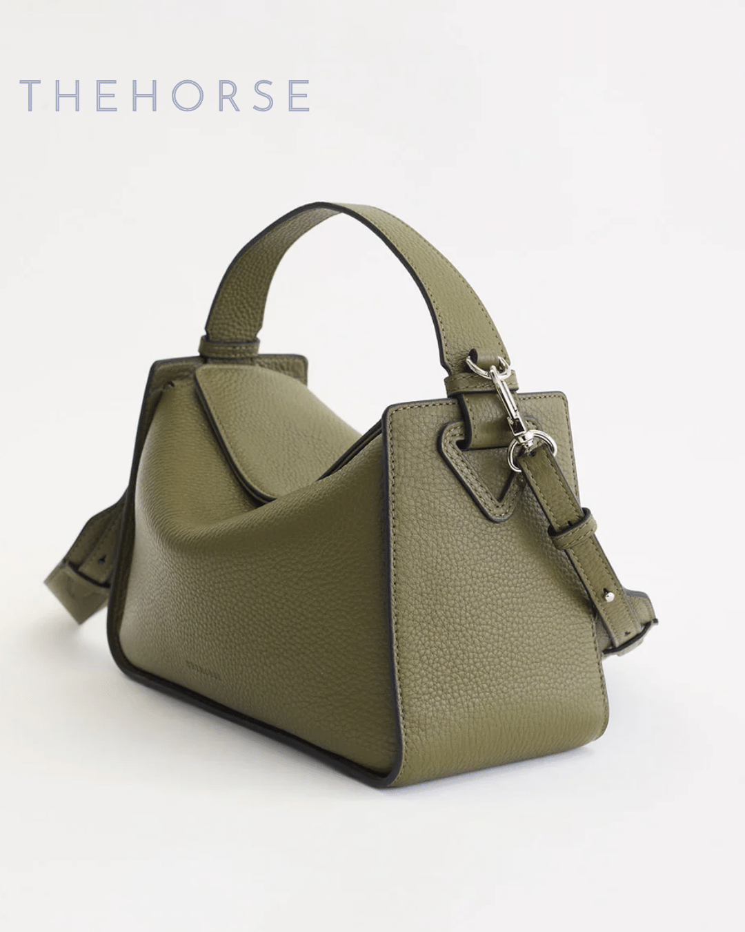 The Horse Clementine handbag in olive green pebbled leather with sculptural shape and top handle.